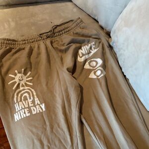 Nike Beige Sweatpants with White Graphic